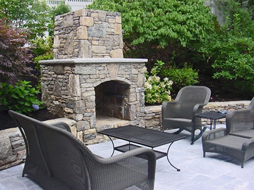Fieldstone Fireplace with Travertine Mantle and Arched Box; Fireplace, Patio and Sitting Wall by New View