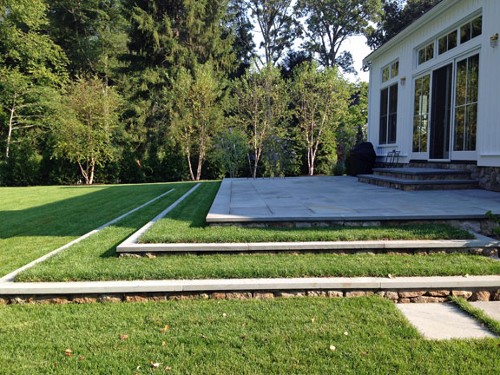 Stone Patio with Sod and Travertine Steps by New View