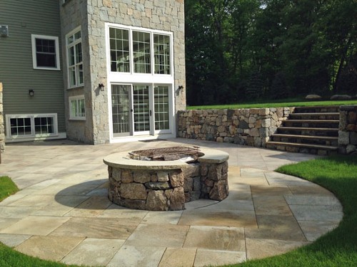 Fire Pit with Granite Patio, Travertine Topped Steps and Retaining Wall by New View