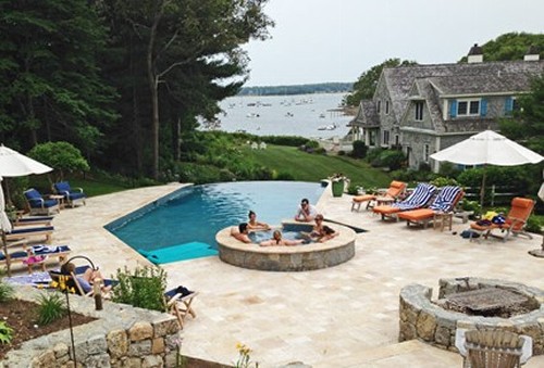 Infinity Edge Pool, Spa, Fire Pit, Travertine Patio and Landscape by New View