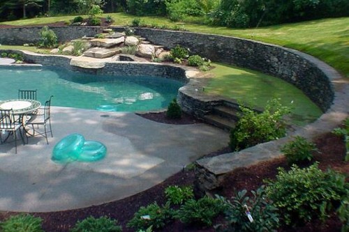 Pool with Retaining Wall, Waterfall and Stone Steps by New View