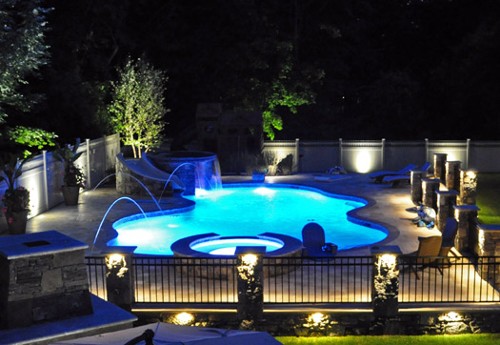 Pool and Spa with Night Lights, Fountains and Slide by New View