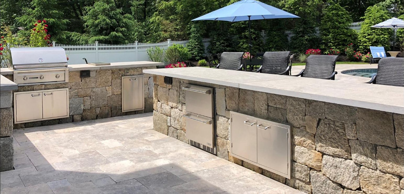 Patio,Landscaping, Stone Bars complete with Grill, Refrigerator drawers & Trash center by New View, Inc.