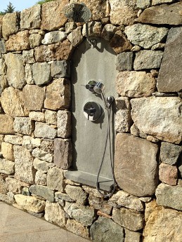 Fieldstone Wall with Outdoor Shower by New View