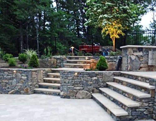 Sunken Travertine Patio& Stone Steps by New View