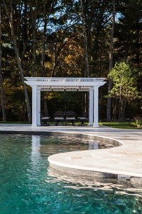 Pool with Stone Waterfall and Paver Deck by New View