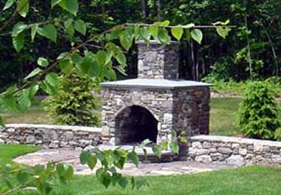 Arched Front Fireplace with Blue Stone Mantle and Patio by New View