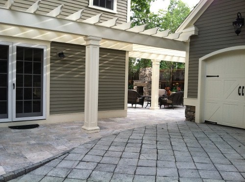 Granite and Travertine Driveway with Pergola by New View