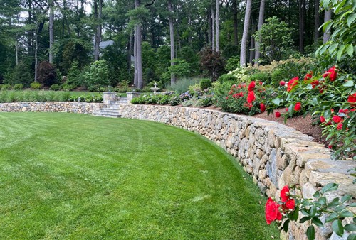 Stone wall, steps and landscape by New View